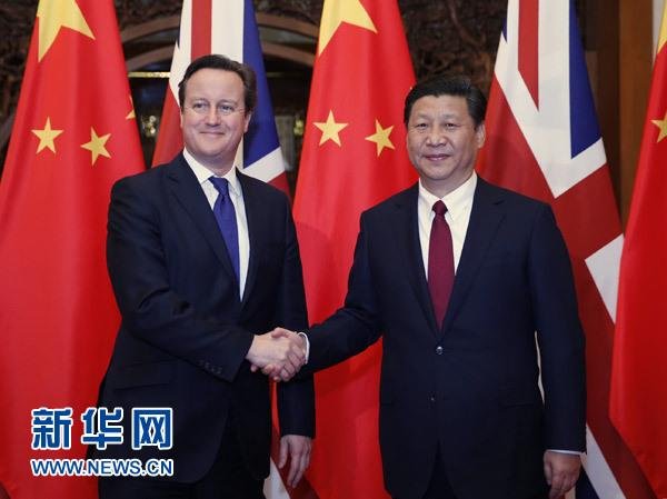 12月2日，國家主席習(xí)近平在北京釣魚臺國賓館會(huì)見英國首相卡梅倫。 新華社記者 鞠鵬 攝