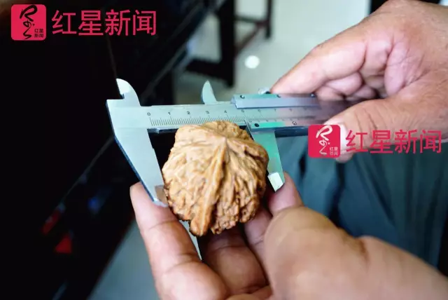 文玩核桃遇冷由幾萬(wàn)一對(duì)降到5元沒(méi)人要？商戶否認(rèn)